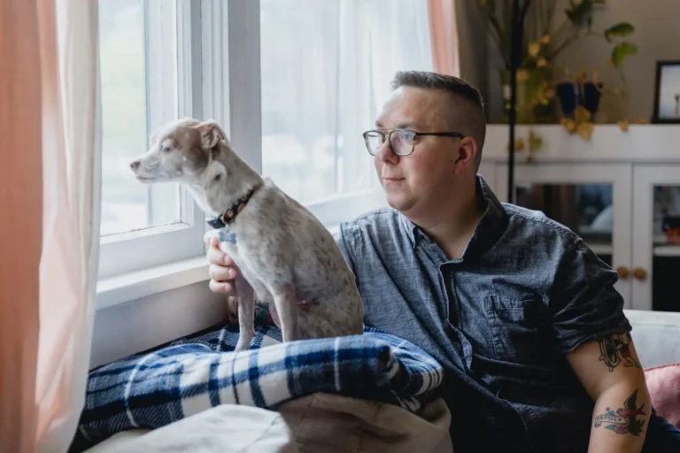 man and his dog at the new home one home property